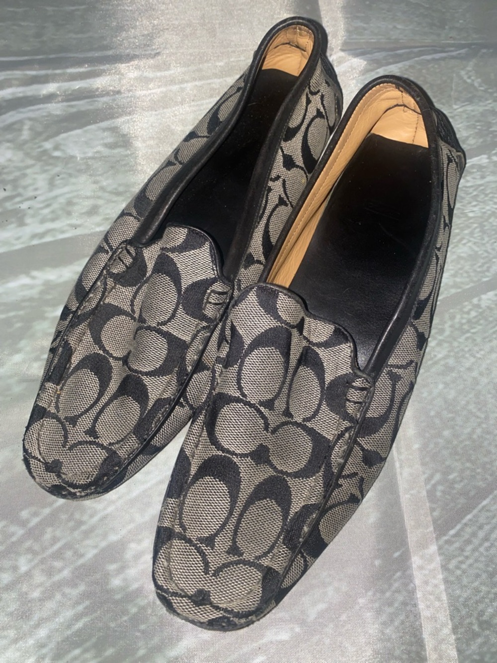 Coach womens Signature Pattern Slip-On Loafers in Black and Gray